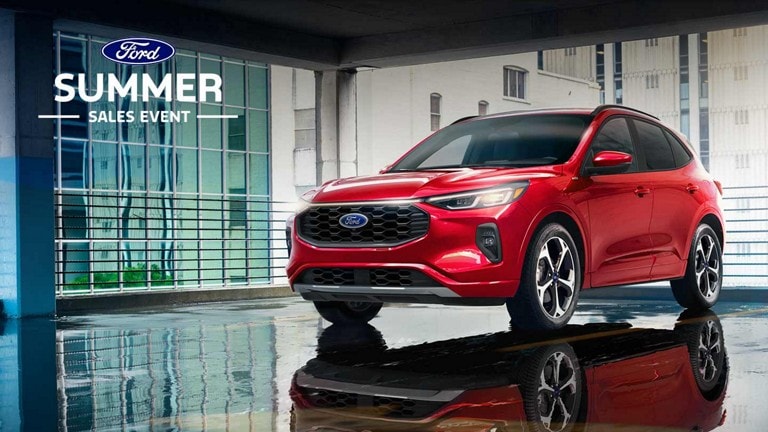 A 2024 Ford Escape® parked in a dealership showroom