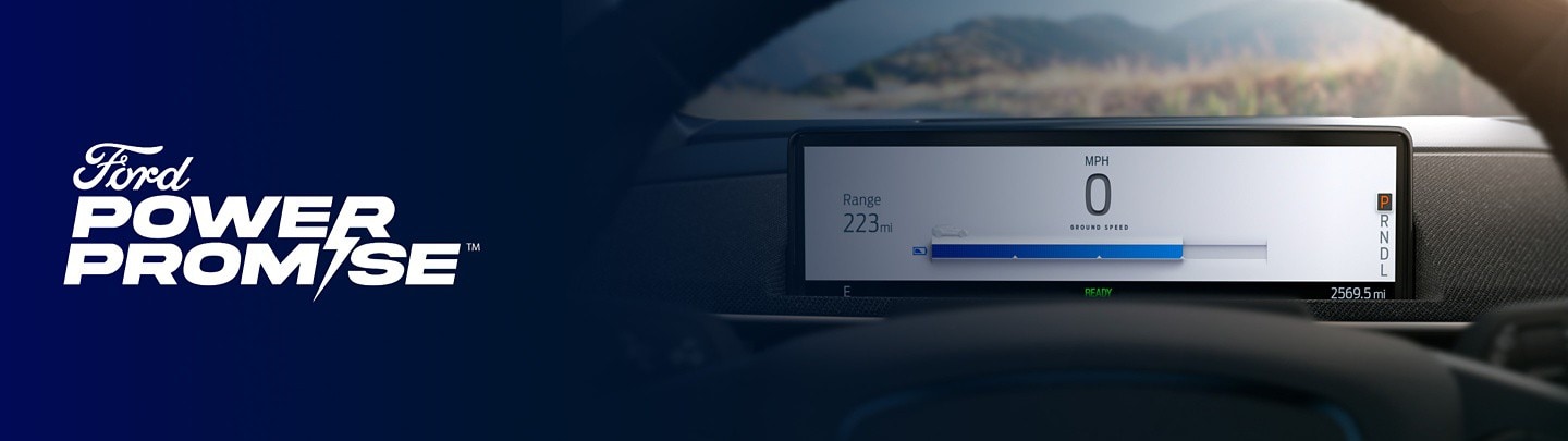 223 miles of available range being displayed on a Ford Mustang Mach-E® dashboard screen with Ford Power Promise logo overlaid