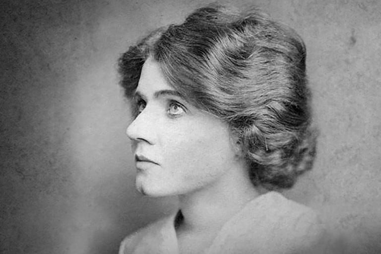 We see a black and white portrait of auto innovator Florence Lawrence.