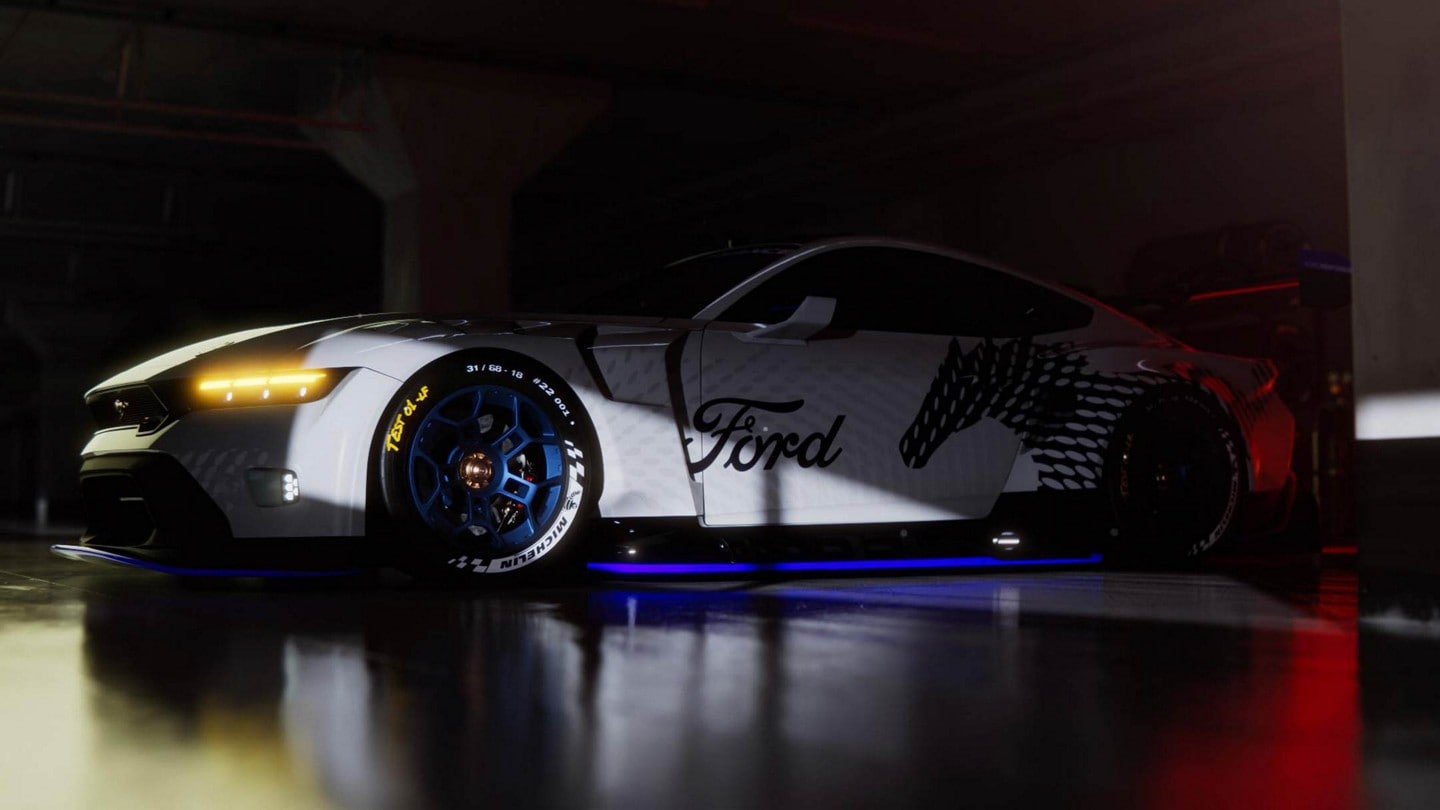 A Ford Mustang® GT3 race car, dramatically lit and partially in shadow