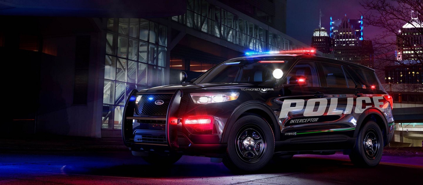 Ford police interceptor utility on a dark city street