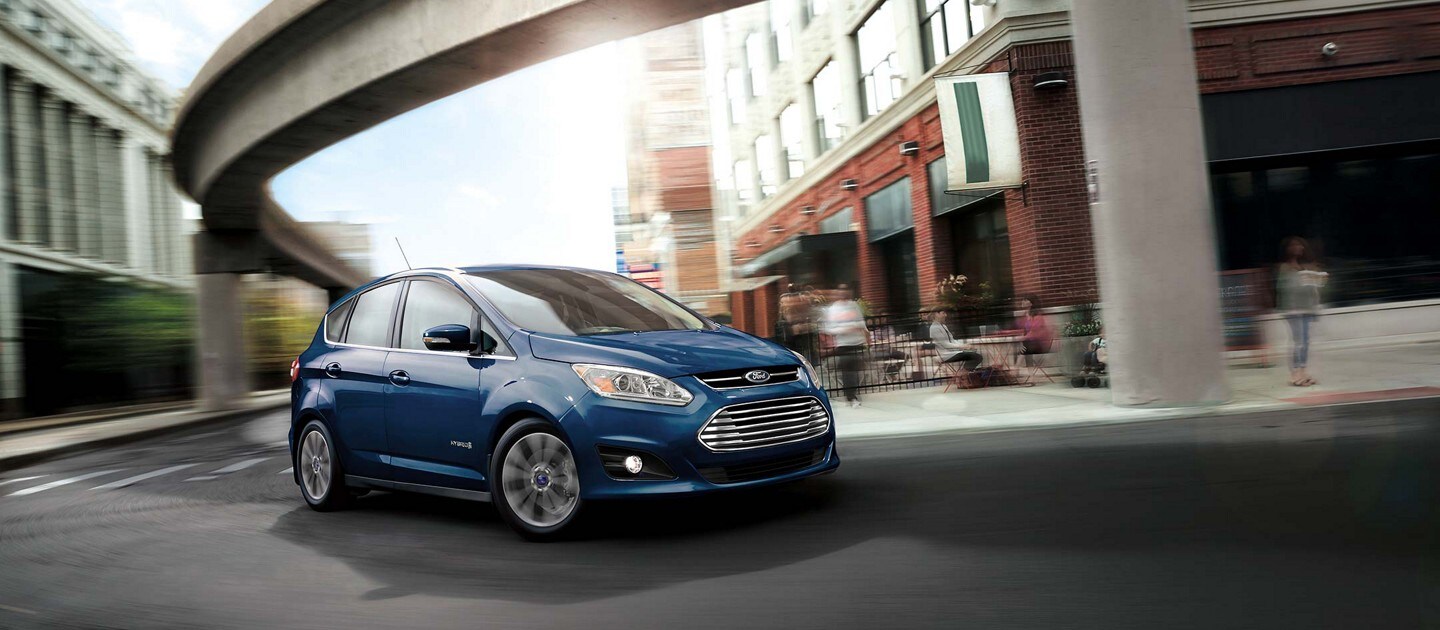 2023 Ford C-Max in Antimatter Blue being driven in the city