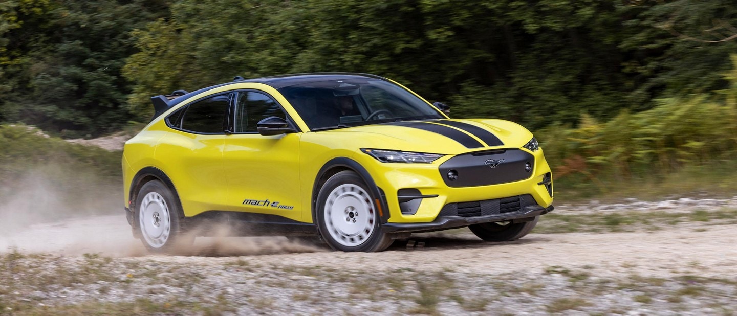 2024 Ford Mustang Mach-E Rally being driven on a dirt road