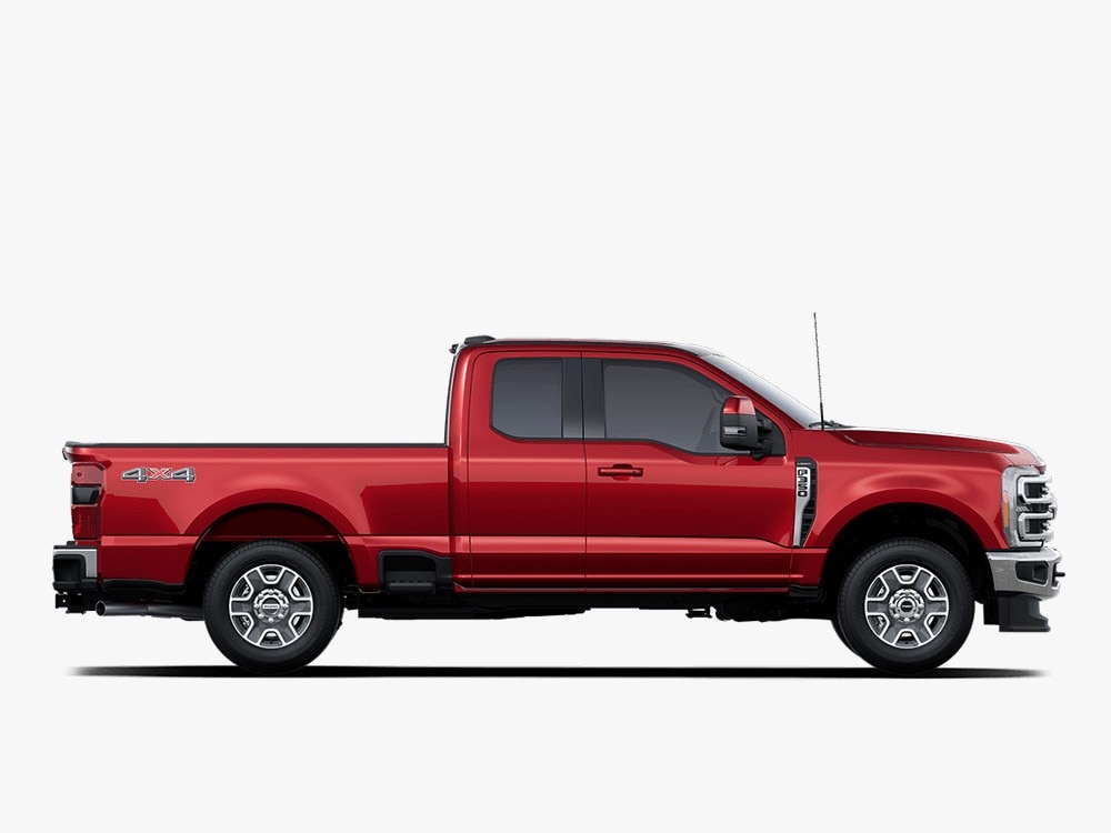 Side view of a red 2024 Ford Super Duty pickup truck.