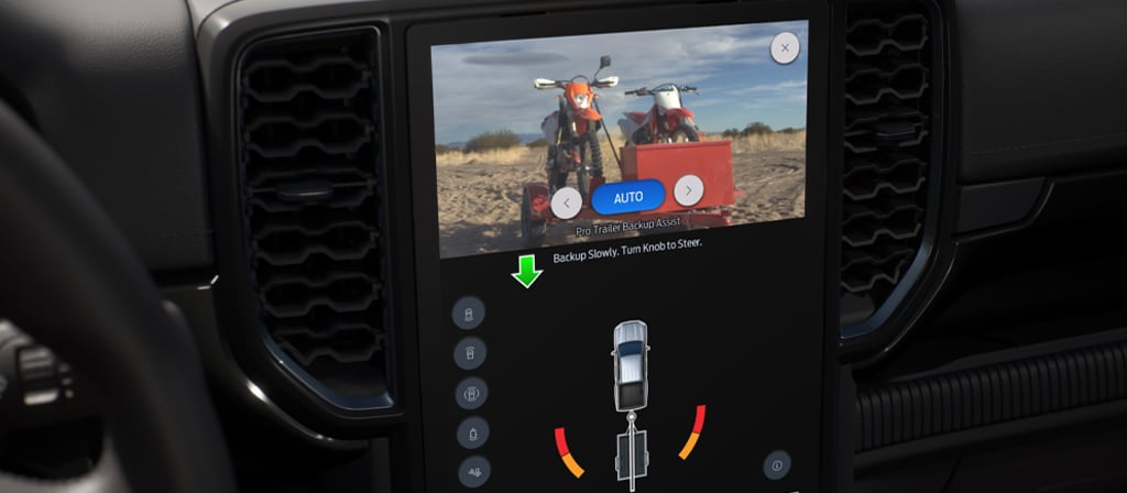 Interior photo showing 2025 Ford Ranger® rearview camera view and towing instructions