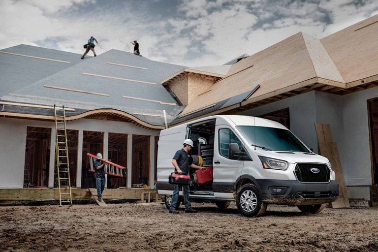 A 2026 Ford Transit® parked at a roofing site